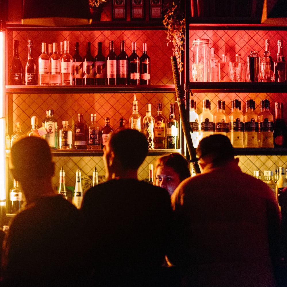 people-standing-at-bar